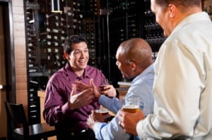 Three men at bar after work